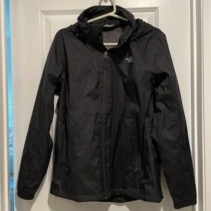The Northface black windbreaker